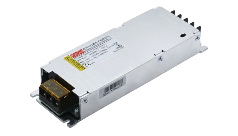 Industrial switching power supply module with warning label and yellow terminal block at one end.