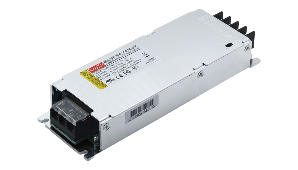 Metal enclosed DC power supply module with a 4-terminal wiring block and rear cooling fins