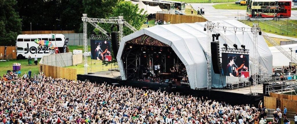 Outdoor event stage using LED video walls for synchronized live video